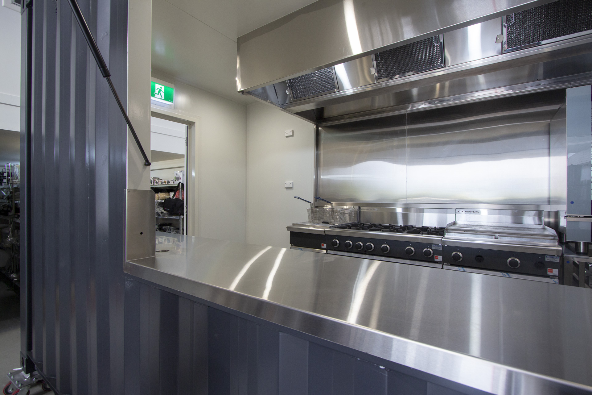 Shipping Container Kitchen Through Servery ?gid=2